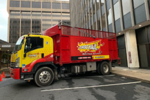 TurboHaul's big red trucks haul more bulk trash and junk than competitors in their service area of Alexandria, Virginia.